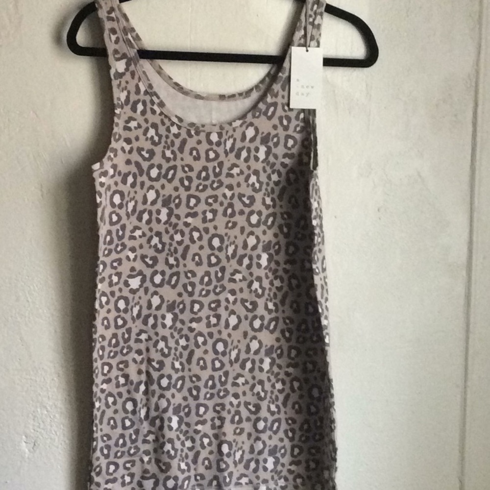 A  new day tank top
